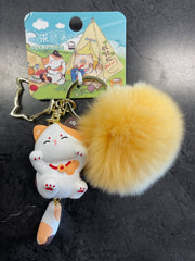 Calico cat with hairball keychain